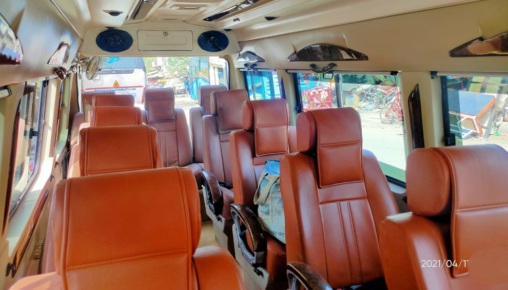 9 Seater Tempo Traveller
